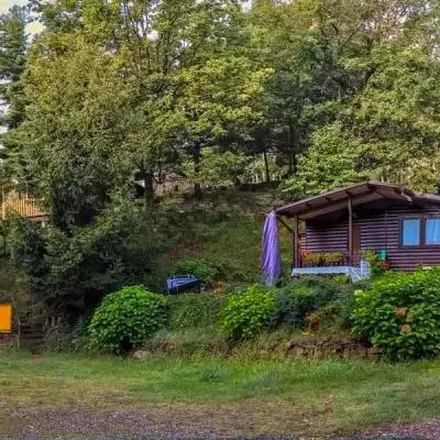 Caravan with wooden chalet and bathroom