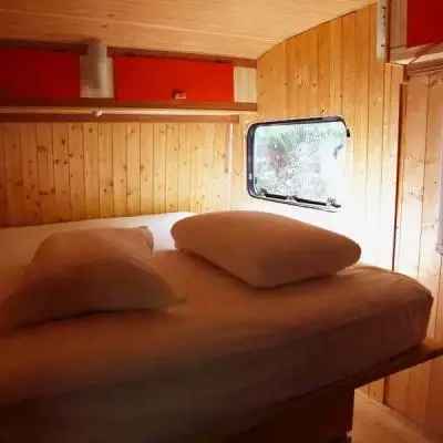 Caravan with wooden chalet and bathroom