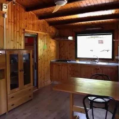 Caravan with wooden chalet and bathroom